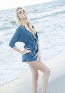 Blonde babe Ms Basil Meadows teases on beach