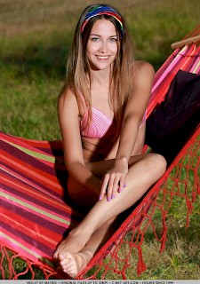 Beautiful sexy young teen Mercedes R gets naked on a hammock