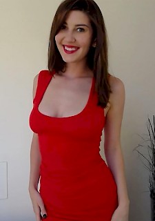 sexy babe Amber Hahn lifts her red dress to play with herself