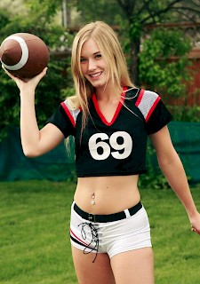 sexy teen Jewel strips out of her football uniform
