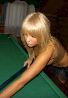 cute blond  play billiards