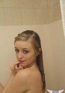 Blonde teen Mandy Roe shows off her perky body in the shower