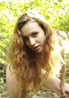 Pretty girl Lu Novia strips naked outdoor
