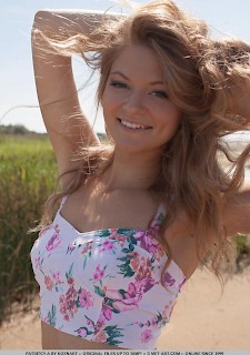 Blonde teen Patritcy A gets naked for you on the beach
