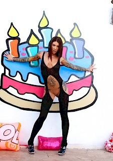 Felicity Feline Spreads Her Ass