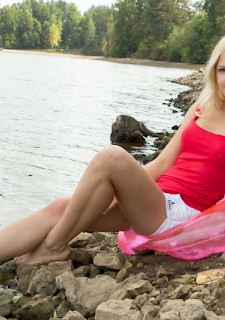cute girl at sea shows body