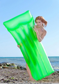 redhead babe Violla A Nude At Beach